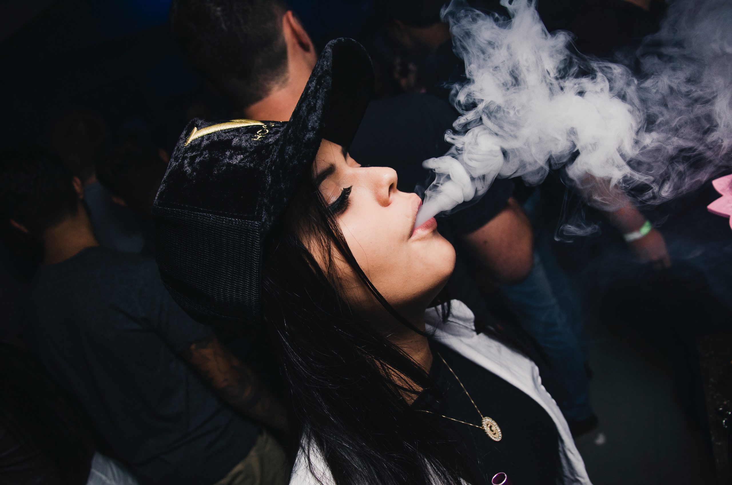 Beautiful girl smokes weed