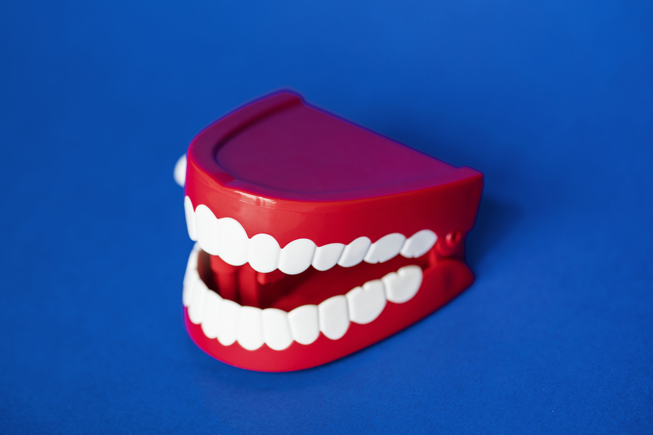Artificial teeth on blue